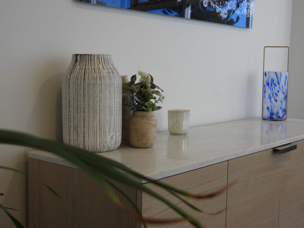 A table with some vases on it